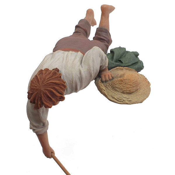 358-Figuras-de-Belén-Montserrat-Ribes-nino-tumbado-con-un-palo2-15cm